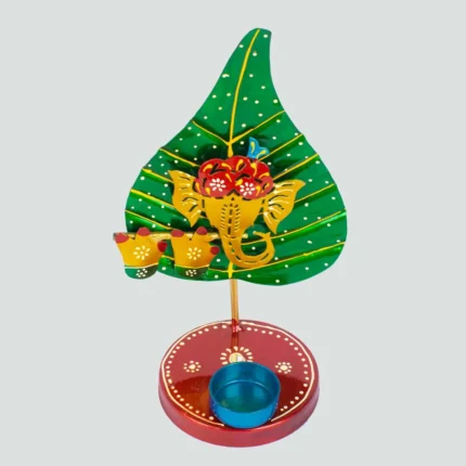 Ganesh ji on leaf (patta) handmade candle /diya stand green