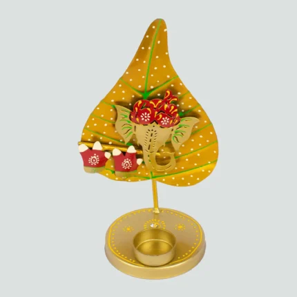 Ganesh ji on leaf (patta) handmade candle /diya stand yellow