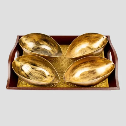 golden tray with metal bowls in golden color handicraft