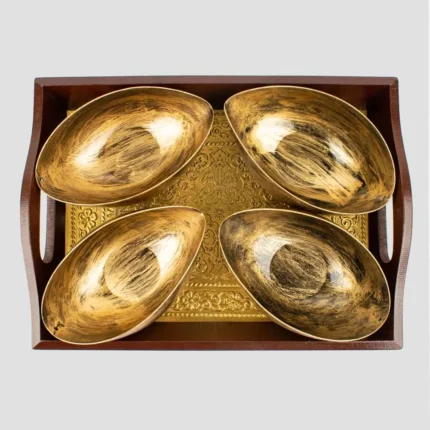 golden tray with metal bowls in golden color handicraft