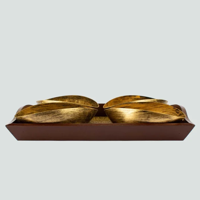 golden tray with metal bowls in golden color handicraft