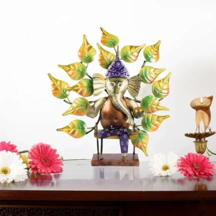 Handcrafted Metal Lord Ganesh Idol with Artistic Leaf Motif